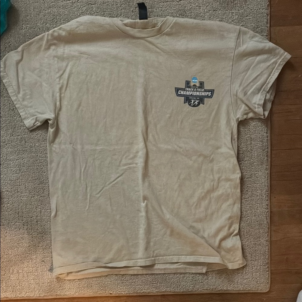 Mens beige D1 track and field championship shirt